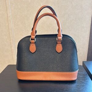 Elegant Black and Tan Handbag